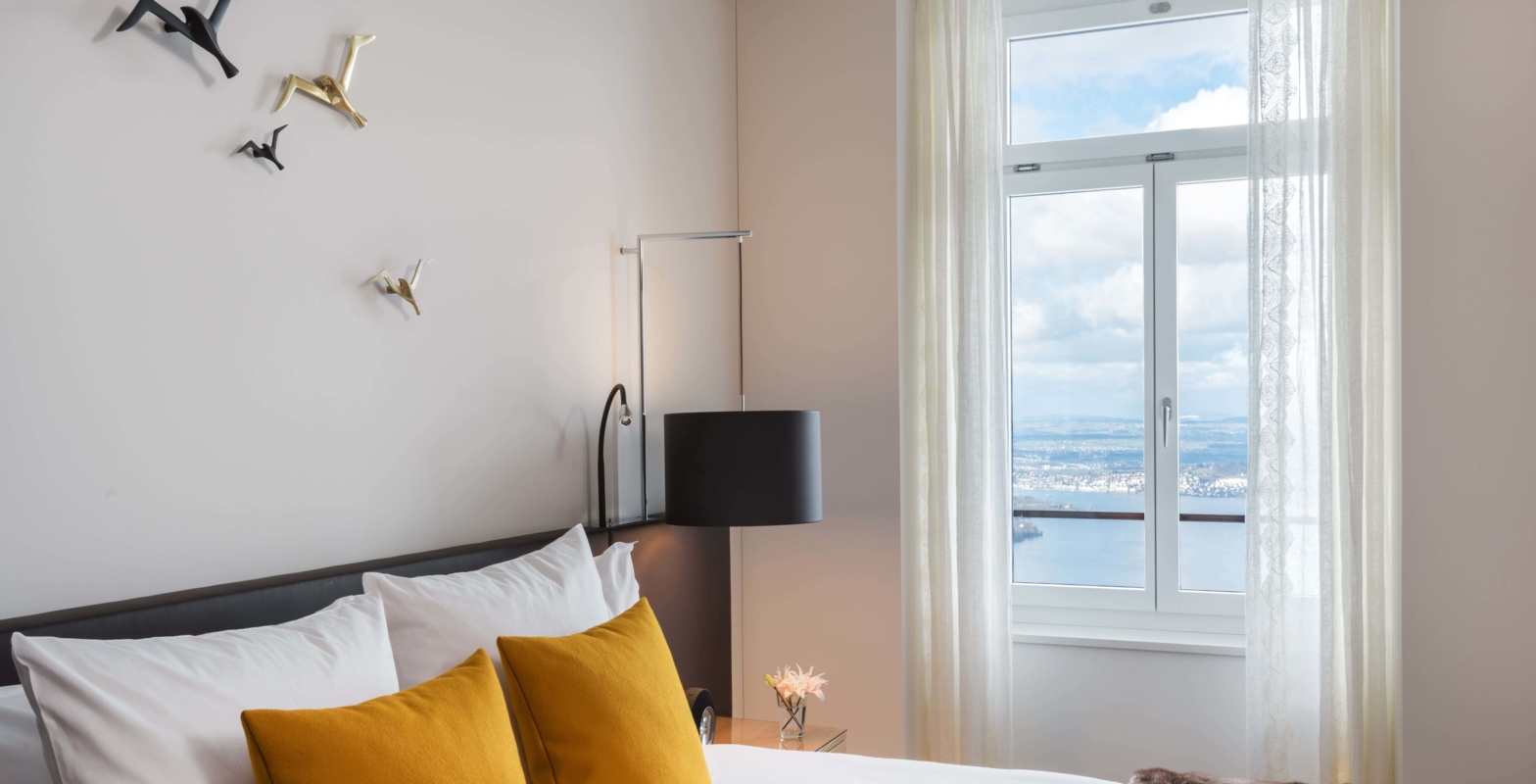 PH_Lakeview Deluxe Room with Balcony_Bed_Window